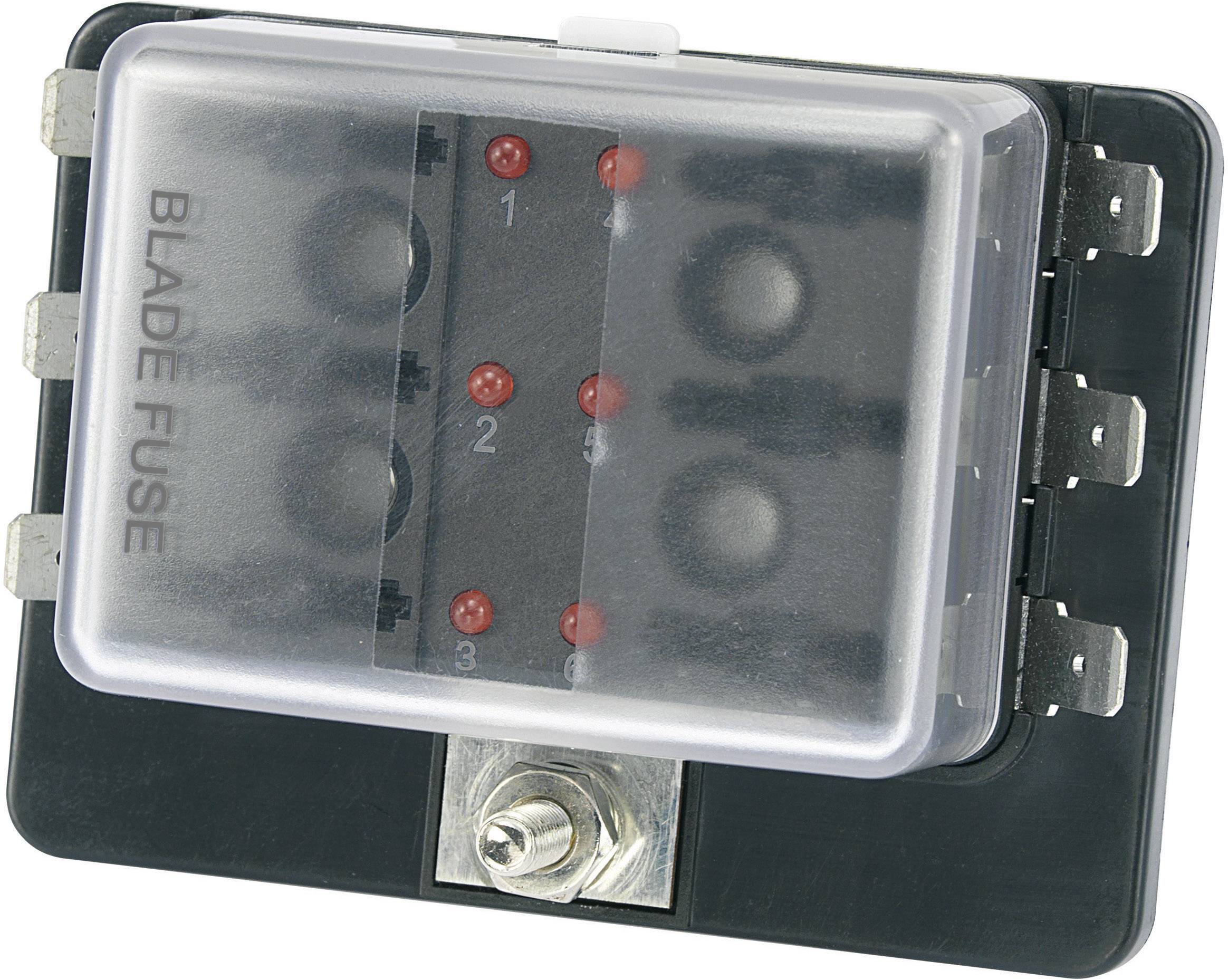 Sort sikringshus med transparent låg, mærket 'Blade Fuse', indeholder fem pladser til flade sikringer.