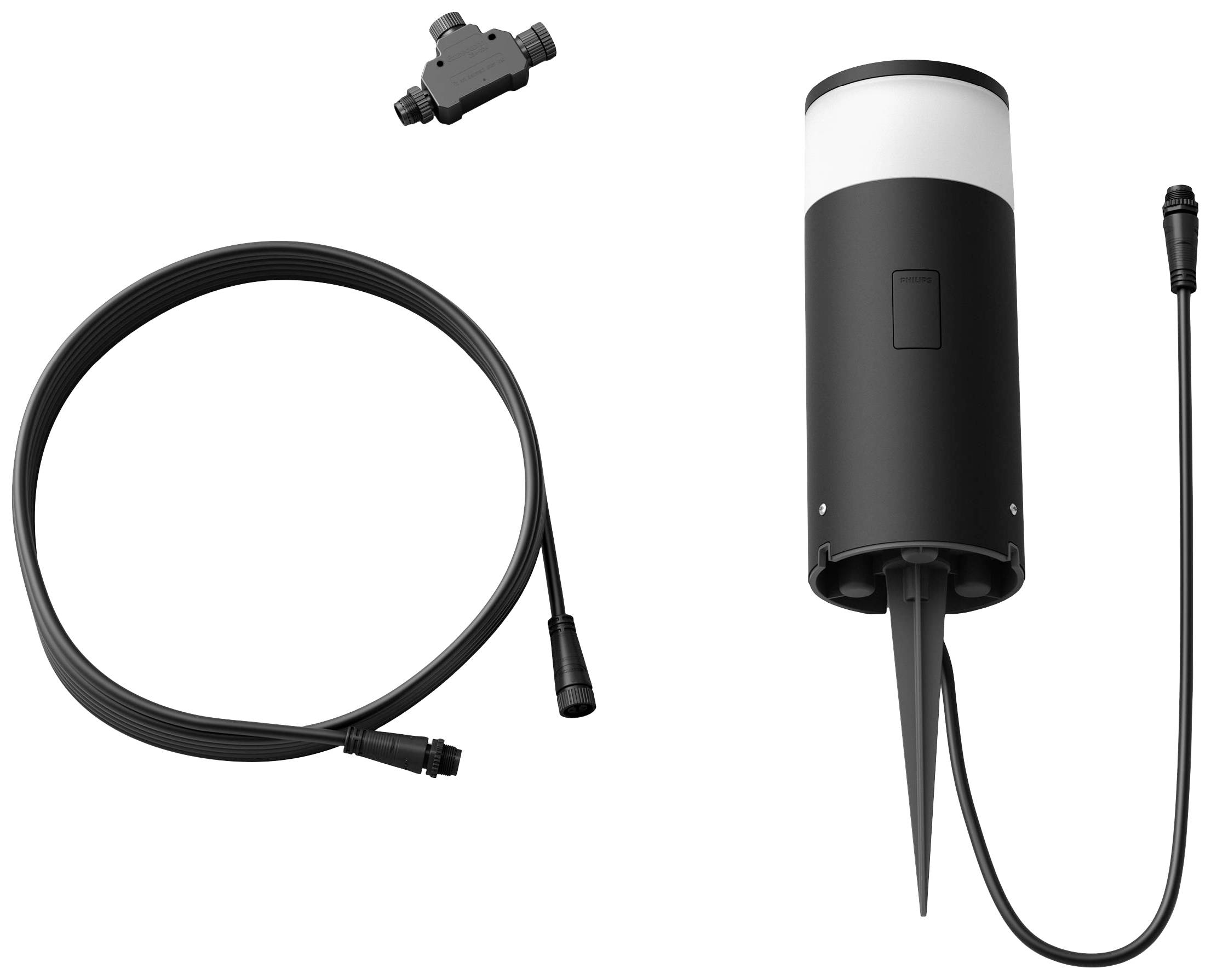 En cylinderformet, sort udendørsenhed med jordspyd, kabel og forbindelsesstykke. Det vil sandsynligvis blive brugt til belysning.
