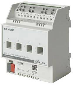 Et hvidt KNX-koblingmodul med tre rektangulære stikpladser, en virksomhedslogo og tekniske oplysninger på forsiden.
