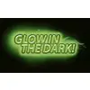 Teksten 'Glow in the Dark!' lyser op i en grøn glans på en sort baggrund.