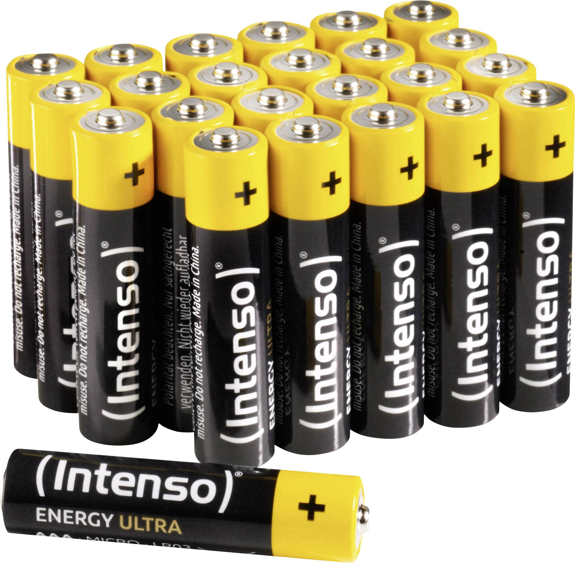En bunke gul-sorte AA-batterier af mærket 'Intenso', delvist på rekke, med et batteri liggende i forgrunden.