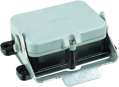 En grå, rektangulær elektrisk stikadapter med metalholdeklips og en sort base.