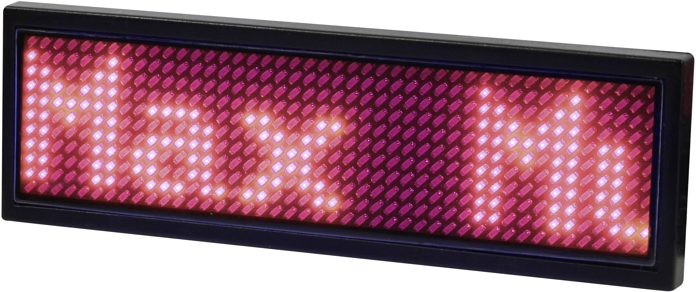 Et lysende skilt med røde LED-lys viser teksten 'Max Mustermann'.