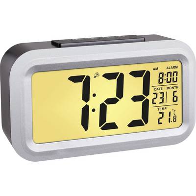 Digital vækkeur viser 7:23, alarm indstillet til 8:00. Dato 23. juni, temperatur 21,8 grader celsius.