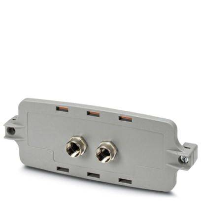 En rektangulær, grå adapter med to metalforbindelser i midten, egnet til industrielle eller tekniske formål.