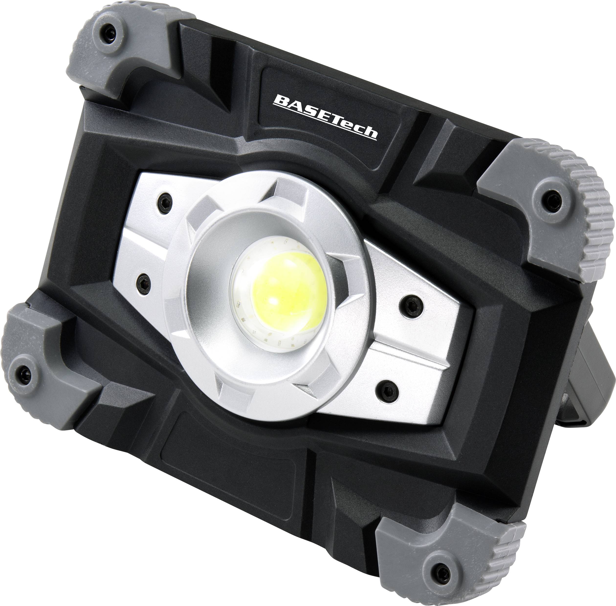 En bærbar LED-projektør i sort og sølv med robust design og et håndtag til at stille den op.