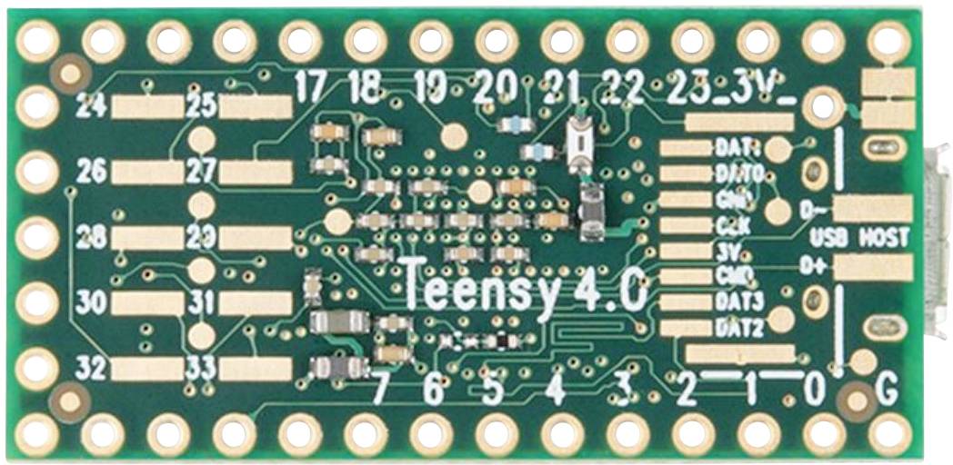 Mikrocontroller-plade 'Teensy 4.0' med talrige forbindelses-ben og mærkninger på grøn printplade.