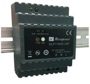 Et elektronisk apparat mærket 'REIGN POWER DLP1100D-24F' til montering på DIN-skinne, som viser ind- og udgang for jævnstrøm.