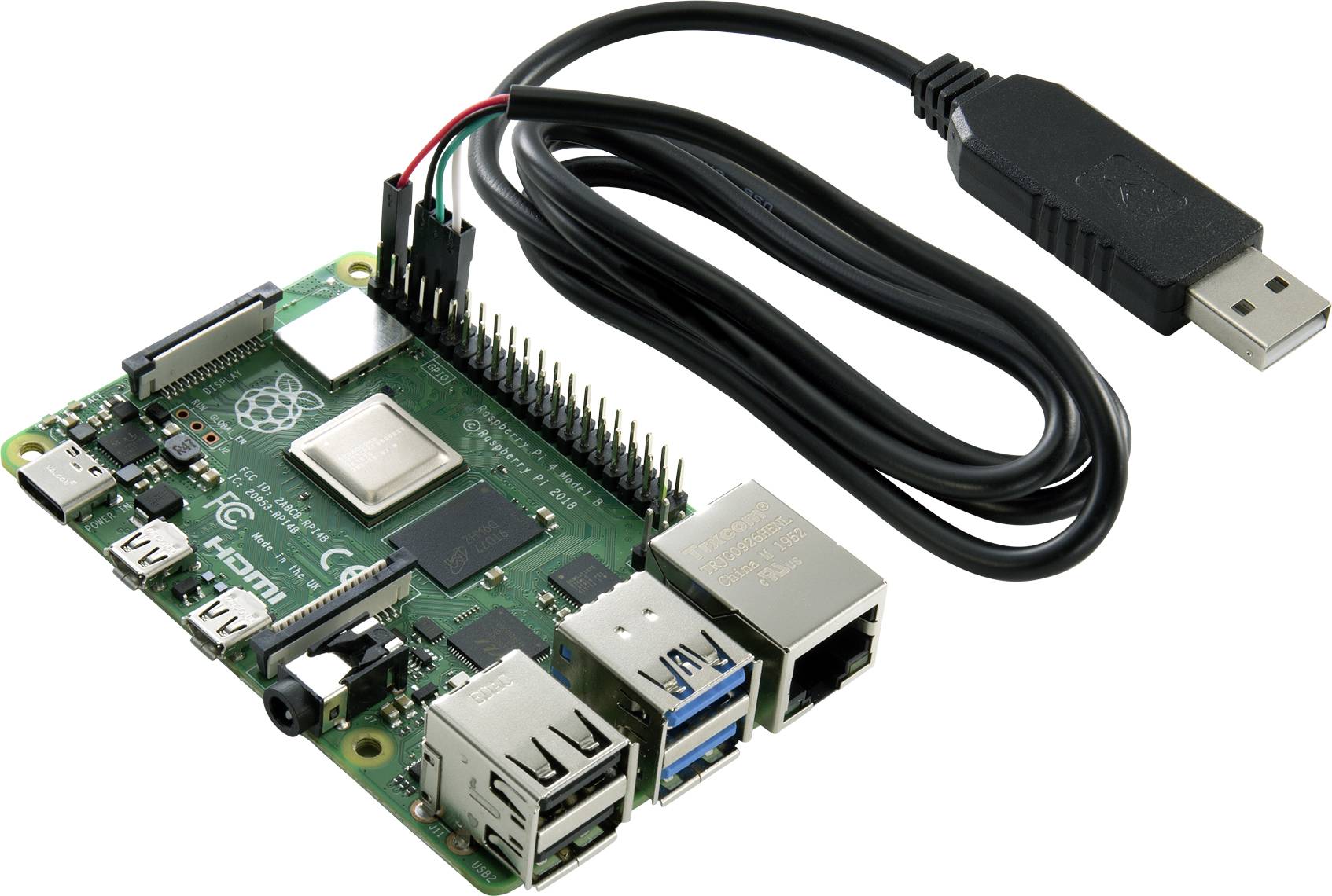 Et grønt Raspberry Pi-board med flere USB-porte og en Ethernet-port, forbundet med et sort USB-kabel.
