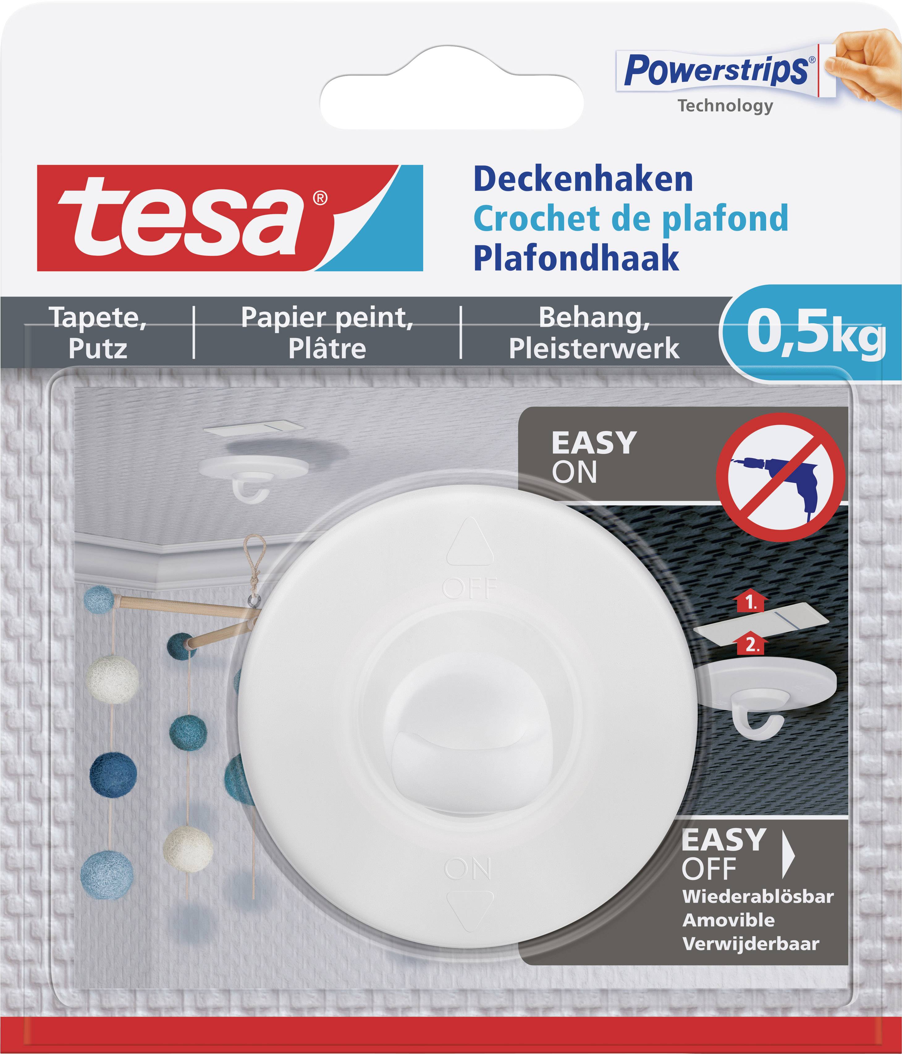 Emballage til en tesa loftkrog til 0,5 kg, egnet til tapet og puds. Produktet viser krogen med vejledning til nem montering.