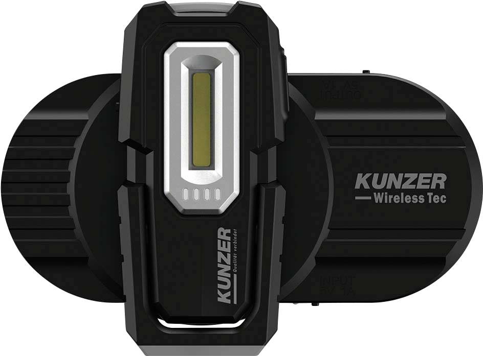 En firkantet sort enhed med metallige detaljer, mærket med 'Kunzer Wireless Tec'.