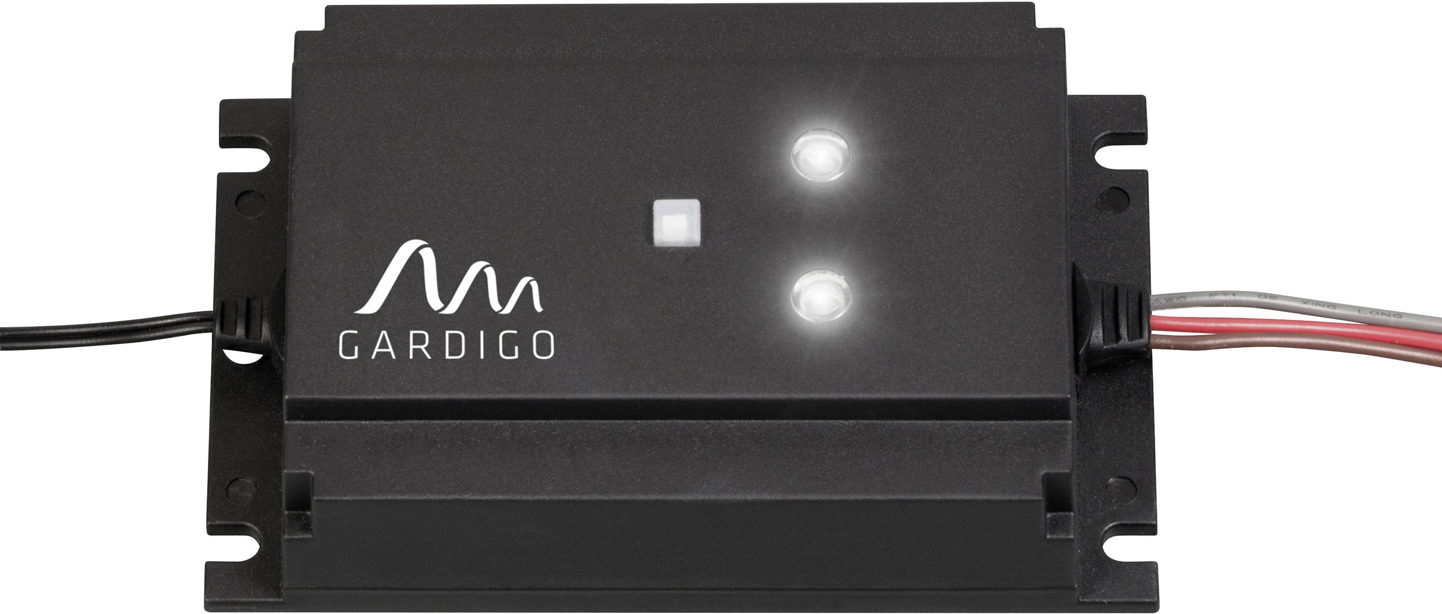 Elektronisk enhed med to lysende LED'er, sort kabinet og kabelforbindelser. Mærket med et logo og navnet 'GARDIGO'.