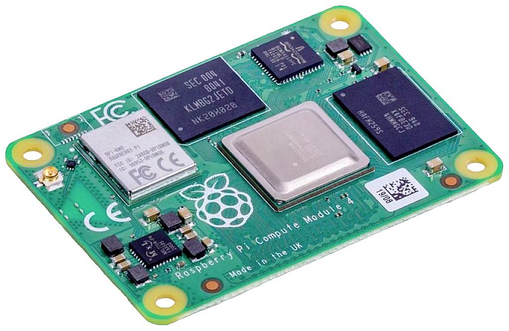 Raspberry Pi Compute Module 3 på et grønt printplade, viser flere integrerede kredsløb, med Hindbær-logoet i midten.