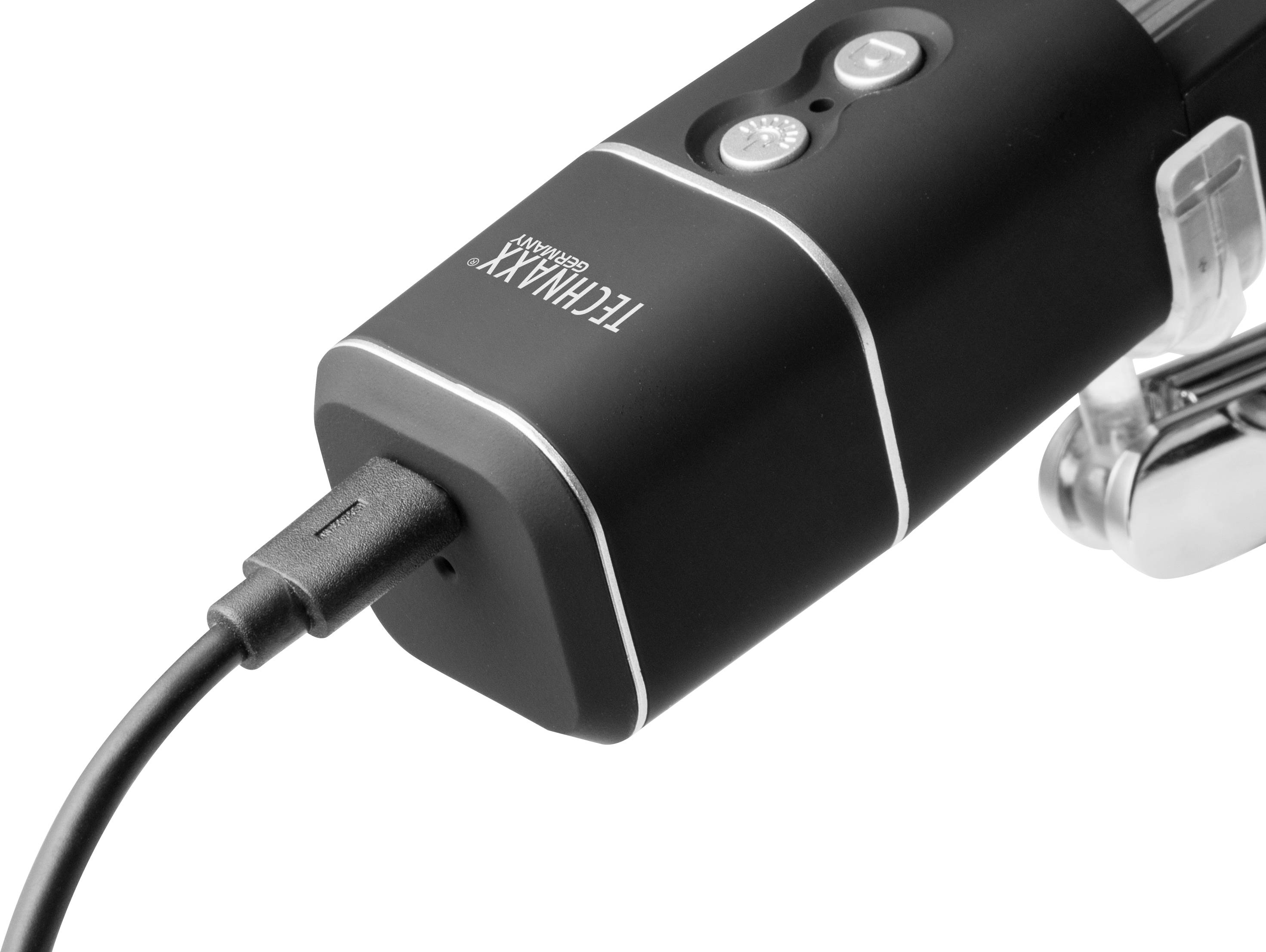 En sort teknisk enhed med USB-kabelstik. Øverst er der to knapper og en LED-lampe.