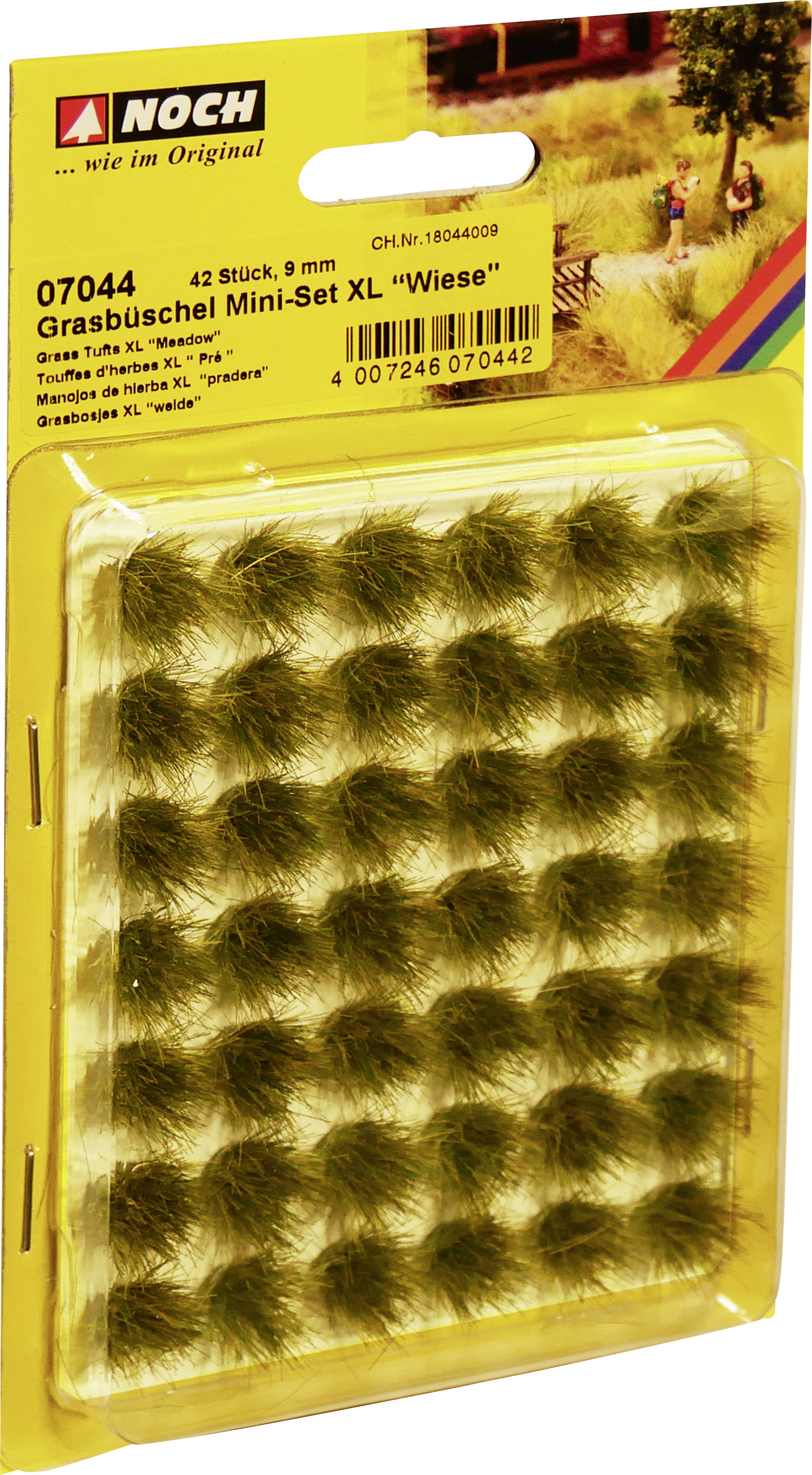 Græstotter Mini-Sæt XL "Eng" fra NOCH, 42 stykker, 9 mm høje i en blisterpakning. Ideel til modellandskaber.
