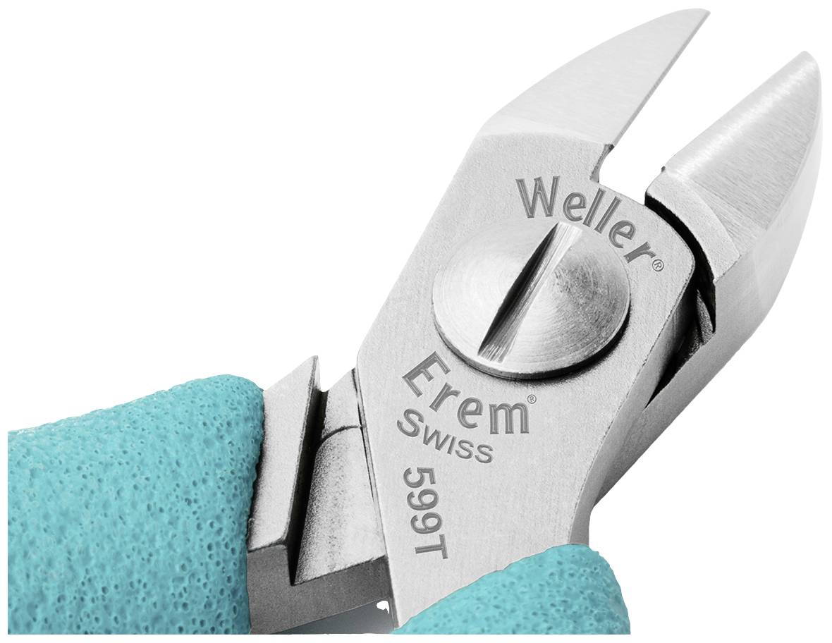 Et par sølv-Weller Erem Swiss 599T præcisionssakse med blåt greb, velegnet til finmekaniske arbejdsopgaver.