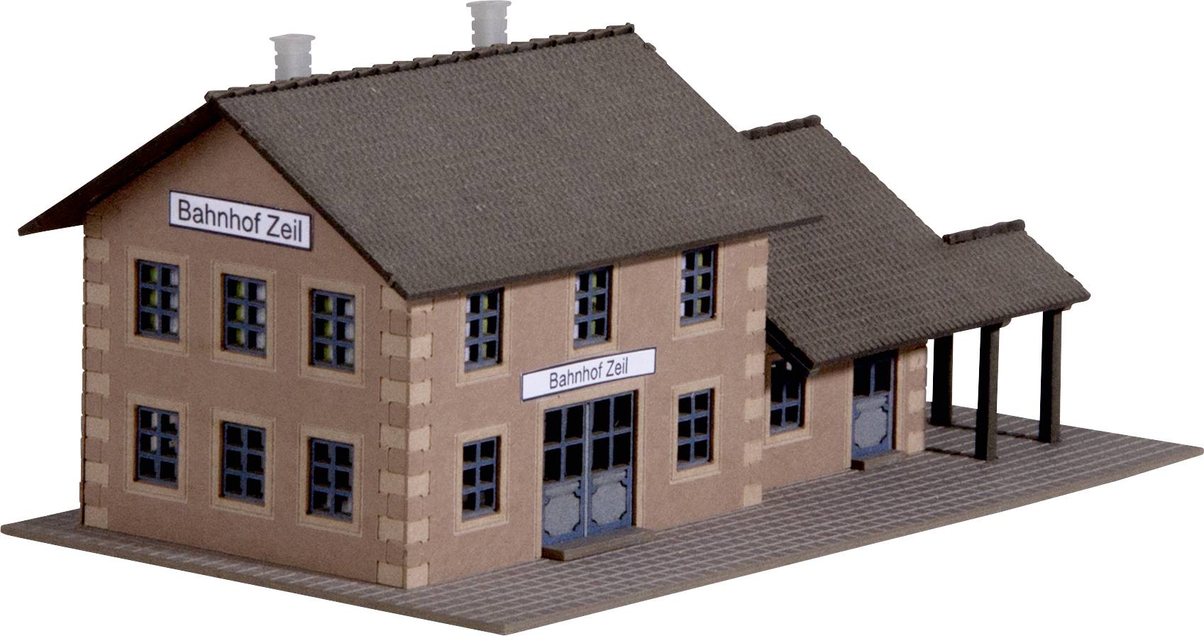 En model af en bygning med påskriften 'Bahnhof Zeil'. Rektangulær form med to skorstene og flere vinduer.