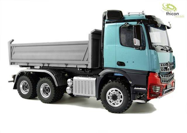 En model af en blå lastbil med tippelad og grå ladeflade, egnet til transport af materialer. Mærkelogo 'thicon models' øverst til højre.