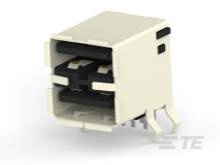En USB-stikforbindelse Type A med rektangulær form og to vandrette tilslutninger. Huset er beige, og metalcontakterne er synlige indvendigt.