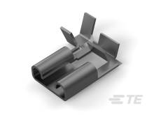 En grå, cylinderformet låsecylinder af metal, set fra oven, med et rektangulært grebsfæste på toppen.