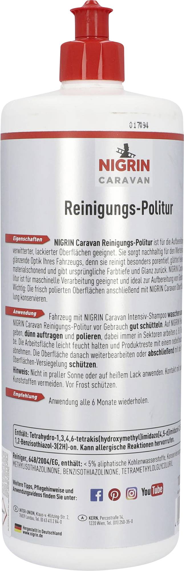 Flaske Nigrin Caravan Rengørings-Polish, hvid med rød låg. Teksten beskriver anvendelse og virkning for lakerede overflader.
