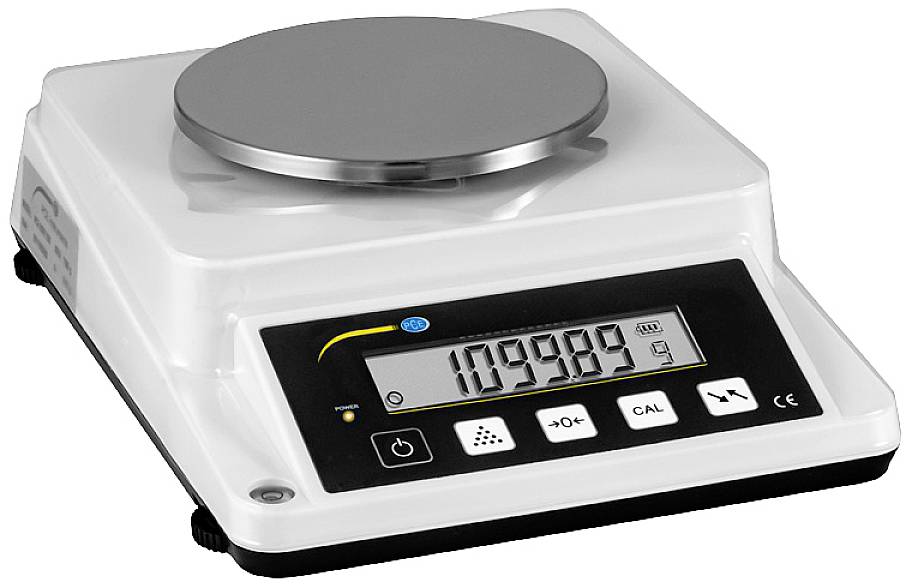 Elektronisk vægt med digital display, viser 1099,99 g. Egnet til præcise vejninger i laboratorier eller industrien.