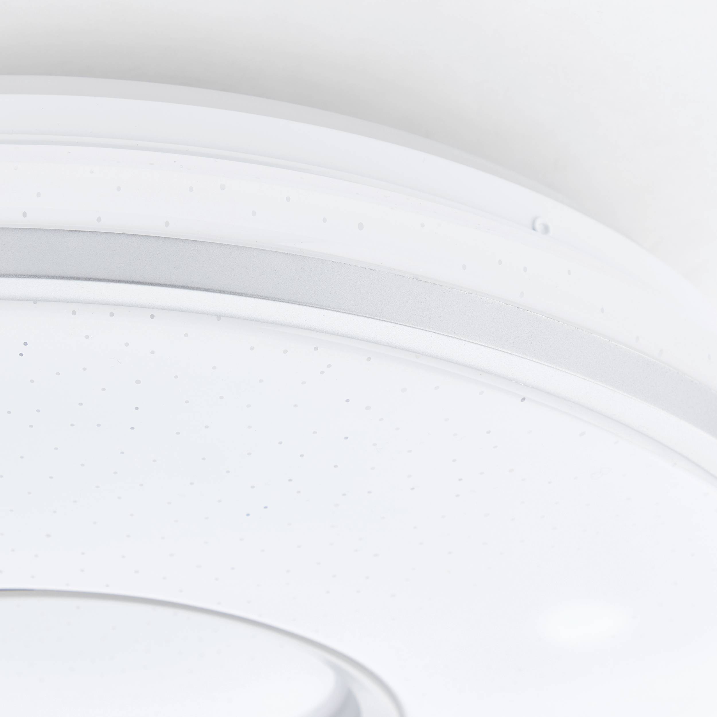 Rund loftslampe med minimalistisk, hvidt design, velegnet til moderne stue- eller kontorområder.
