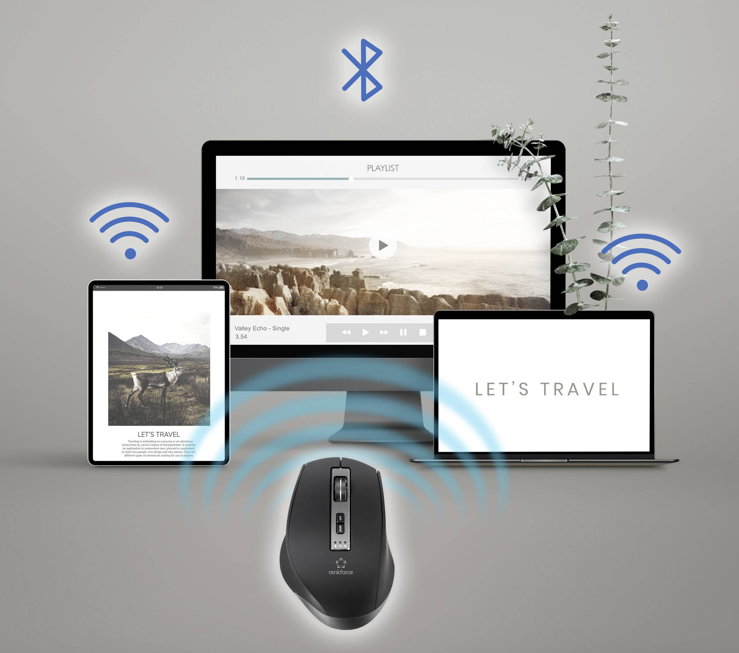Computerskærm, laptop og tablet forbundet med trådløse symboler gennem en trådløs mus. Skærmen viser et landskabsfoto og en spilleliste.