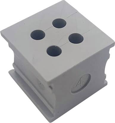Grå plastkube med fire runde huller på oversiden og et symbol på siden.