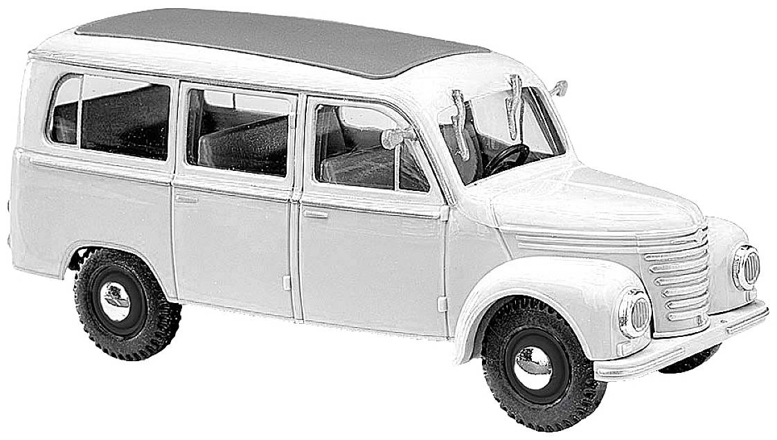 En model af en klassisk hvid minibus i retro-design med afrundet tag og fem vinduer på venstre side.