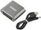 En SCART-til-USB-adapter fra SpeaKa Professional med et tilhørende USB-kabel.