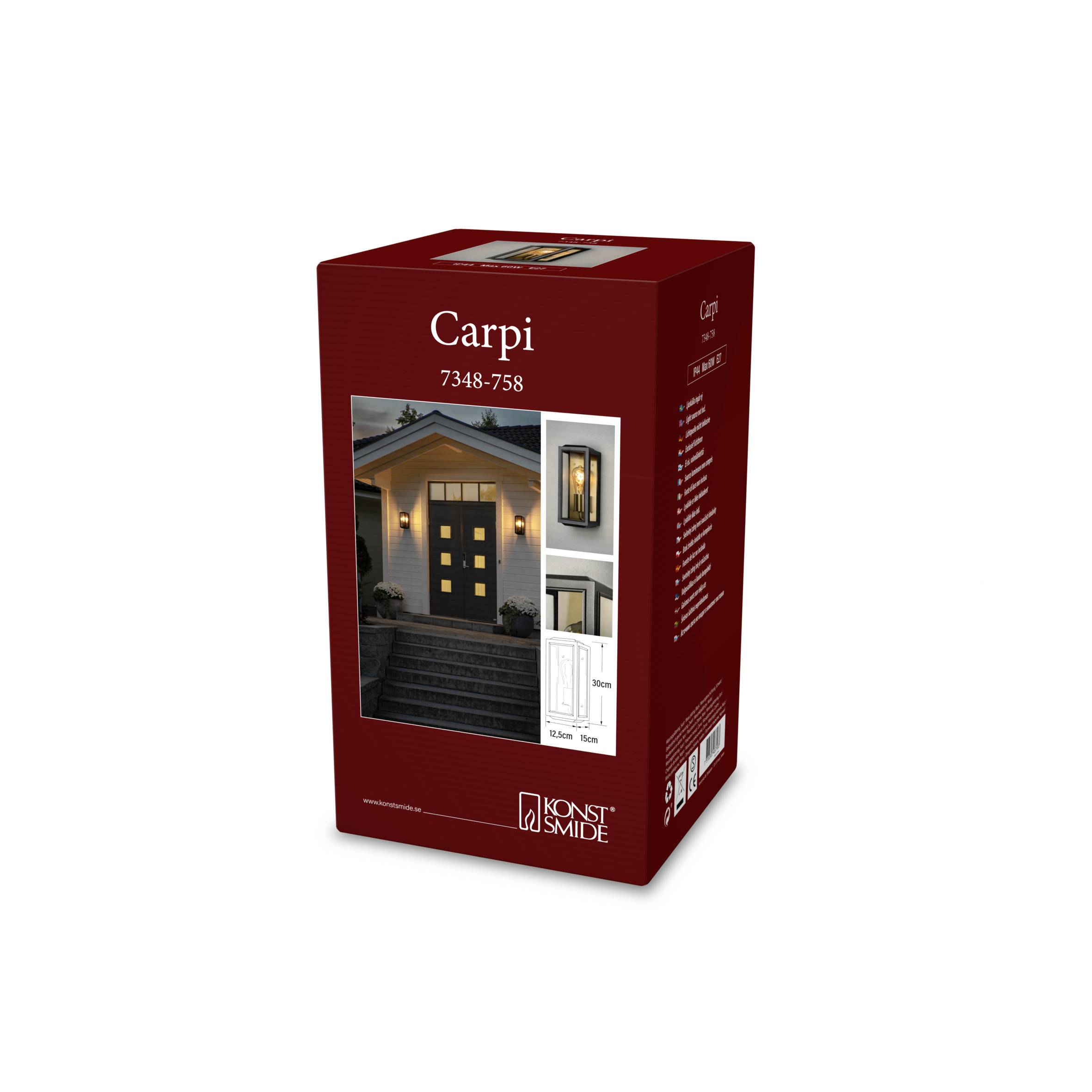 En rød emballage med et billede af en udendørslampe 'Carpi' ved siden af en hoveddør. Produktnummer 7348-758, mærke Konst Smide.