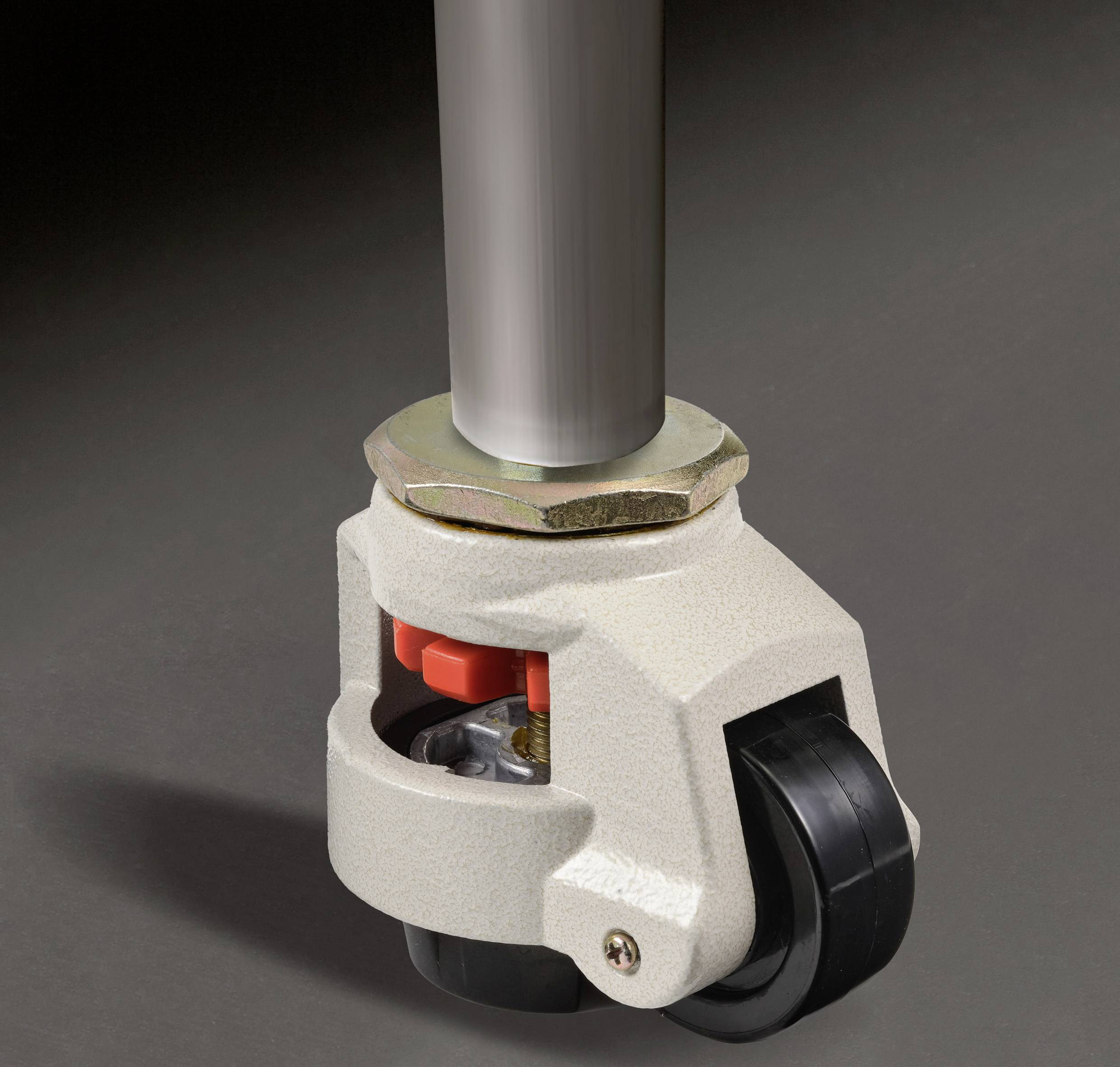 Et enkelt hjul med gråt hus og sort hjul monteret på en stang, muligvis en del af et møbel eller en maskine.