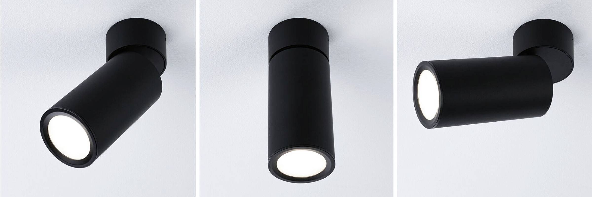 Tre sorte cylinderformede loftslamper med mat finish, der viser forskellige hældningsvinkler.