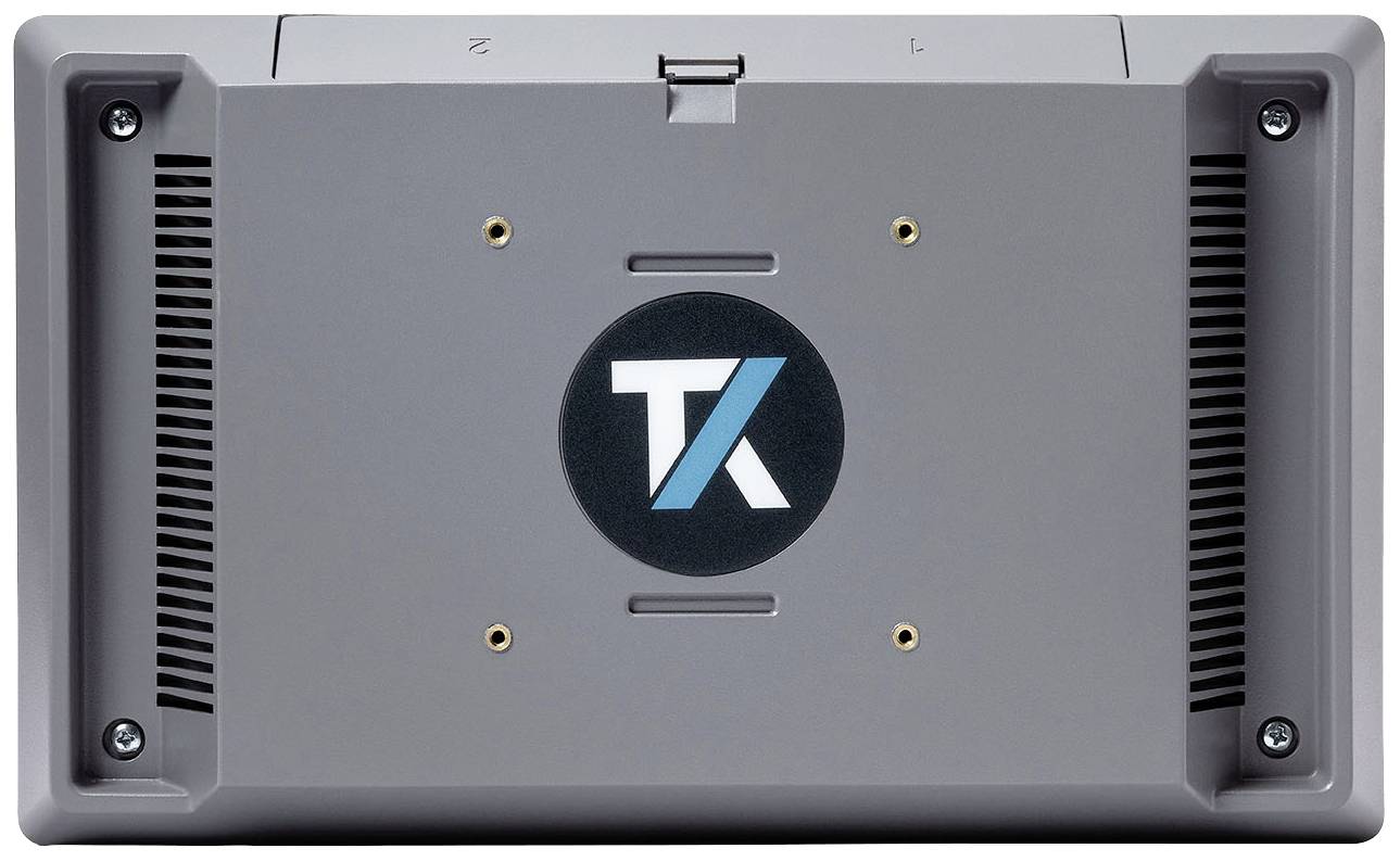 Bagvisning af en grå elektronisk enhed med et 'TK'-logo i midten. Skruehuller er synlige i hjørnerne.