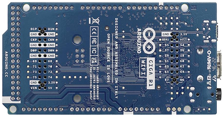 Arduino-mikrocontrollerprint med flere tilslutninger og kredsløb. Mærkninger viser tilslutningspins.