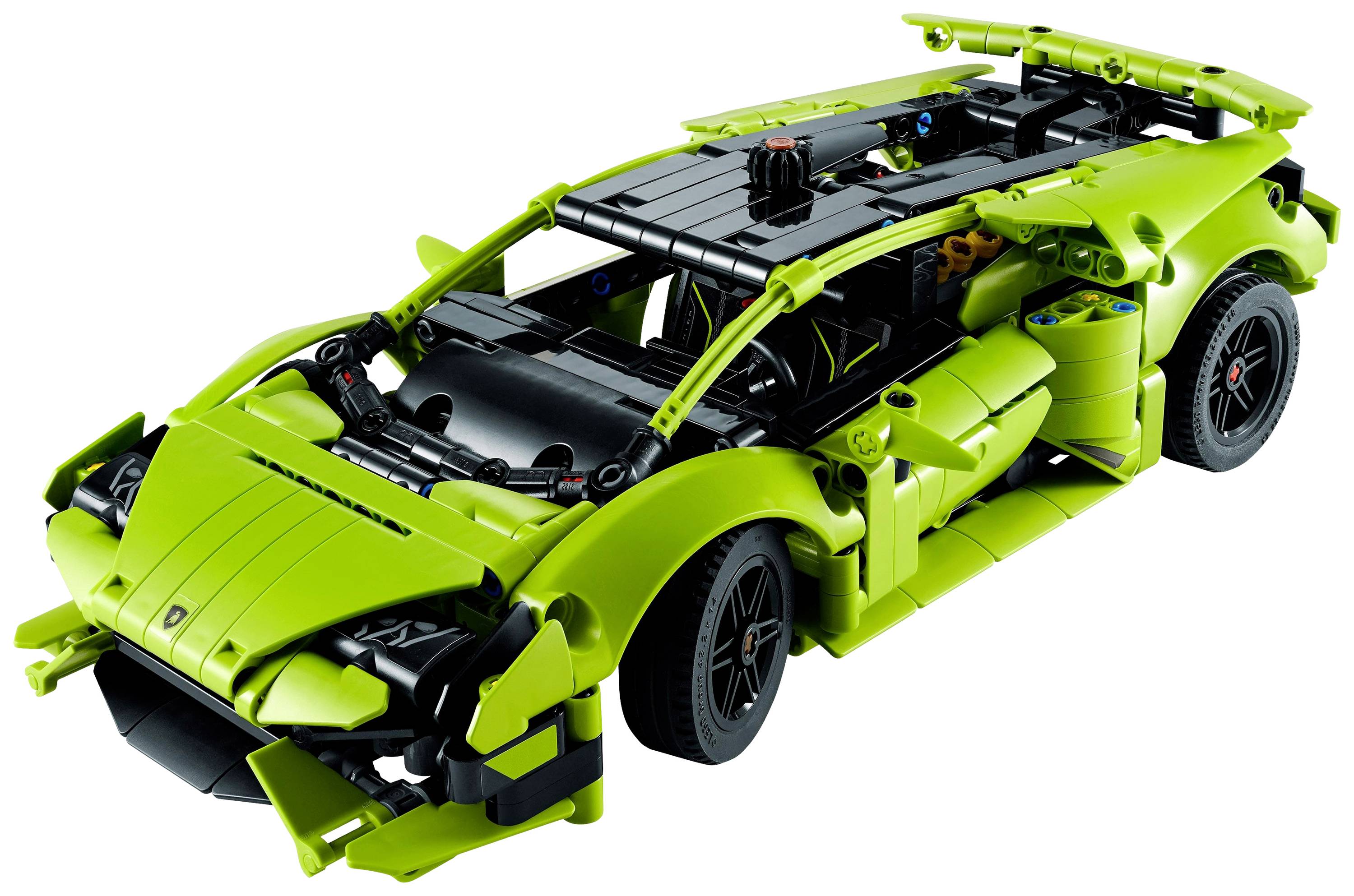 Grøn LEGO-bil i sportsvognsdesign med synlige tekniske detaljer og aerodynamiske træk.
