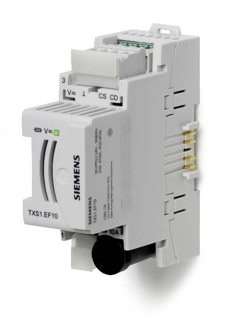 Et Siemens TXS1.EF10 udvidelsesmodul med hvidt kabinet, grøn LED-indikator og flere tilslutninger, som bruges i bygningsautomatiseringssystemet.