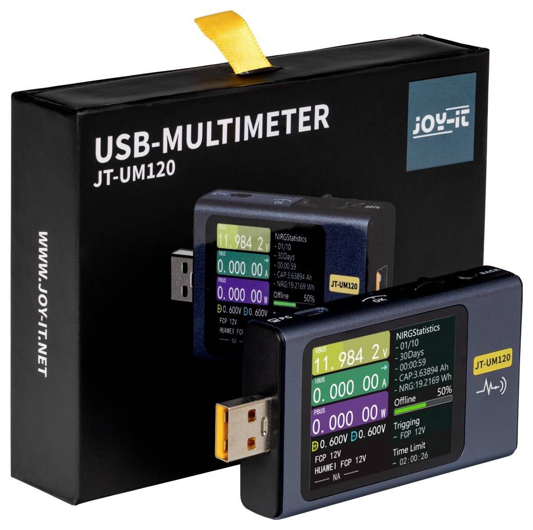 USB-multimeter JT-UM120 fra Joy-It, viser forskellige elektriske måleværdier på en farvet skærm. Emballage i baggrunden.