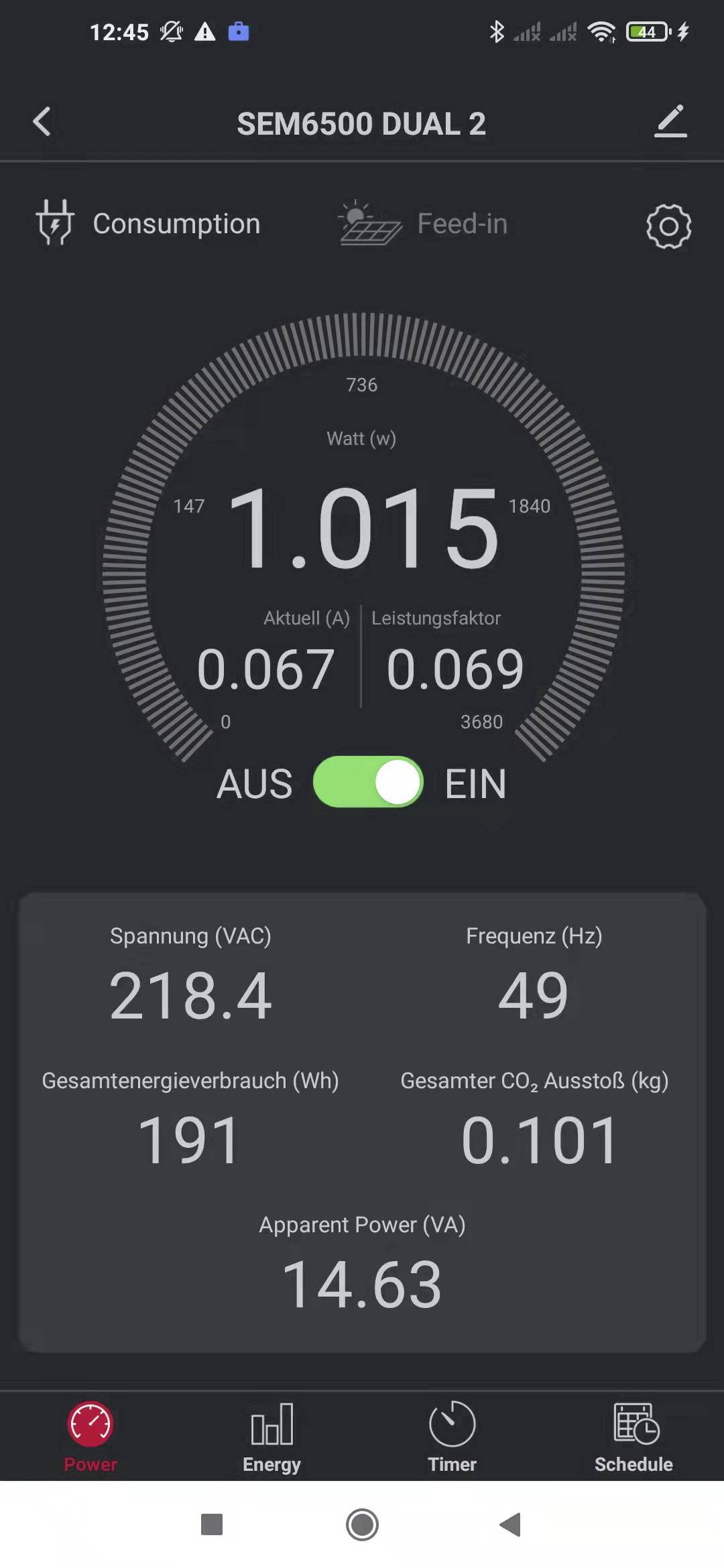 'SEM6500 DUAL 2' visning på smartphone; viser strømforbrugsdata: Effekt 1.015 Watt, forbrug 0.067 kWh, udledning 0.101 kg CO2.