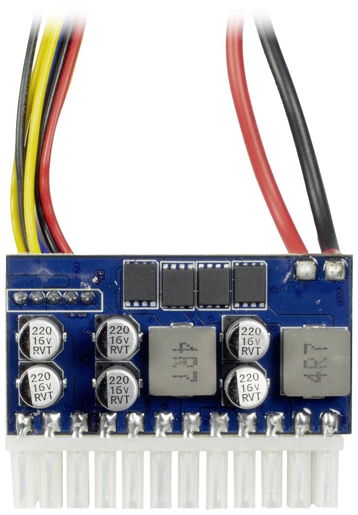 Et blåt elektronikkort med flere kondensatorer og farvede kabler, der rager op foroven.