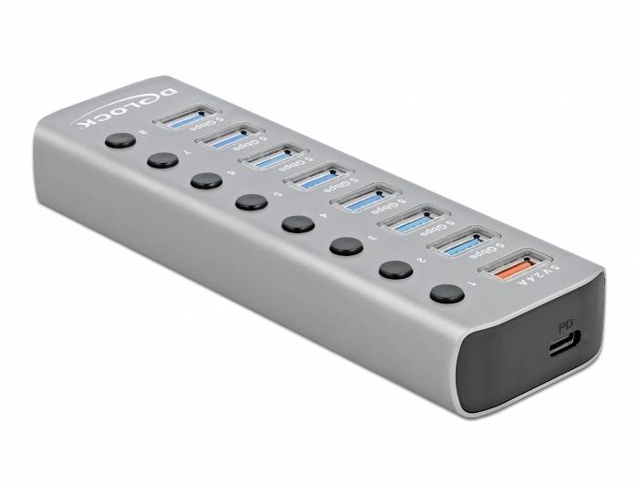 USB-hub med ti porte, hvoraf ni er USB-A og én er USB-C. Hver port kan tændes og slukkes individuelt. Sølvfarvet, rektangulær kabinet.