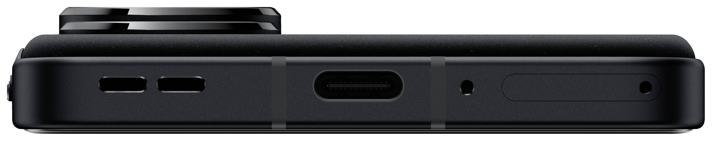 Sidevinkelbillede af en sort smartphone, der viser portene i bunden: to små åbninger, en USB-C-port og en mikrofon.