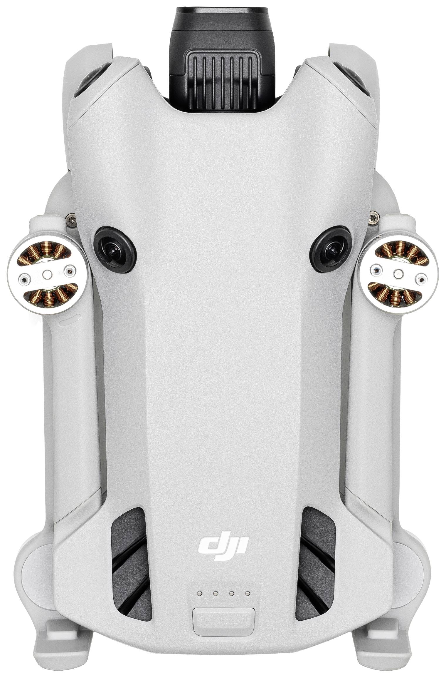 Droneoverblik set fra oven, viser den øverste afdækning med "DJI" logo og begge motorer.