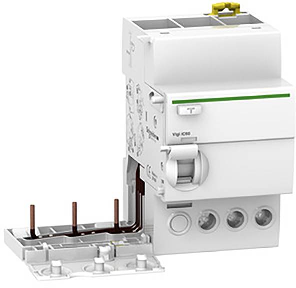 En hvid elektrisk kontakt med drejeknap og grøn linje øverst, monteret på en tilslutningsblok med synlige kabelforbindelser.