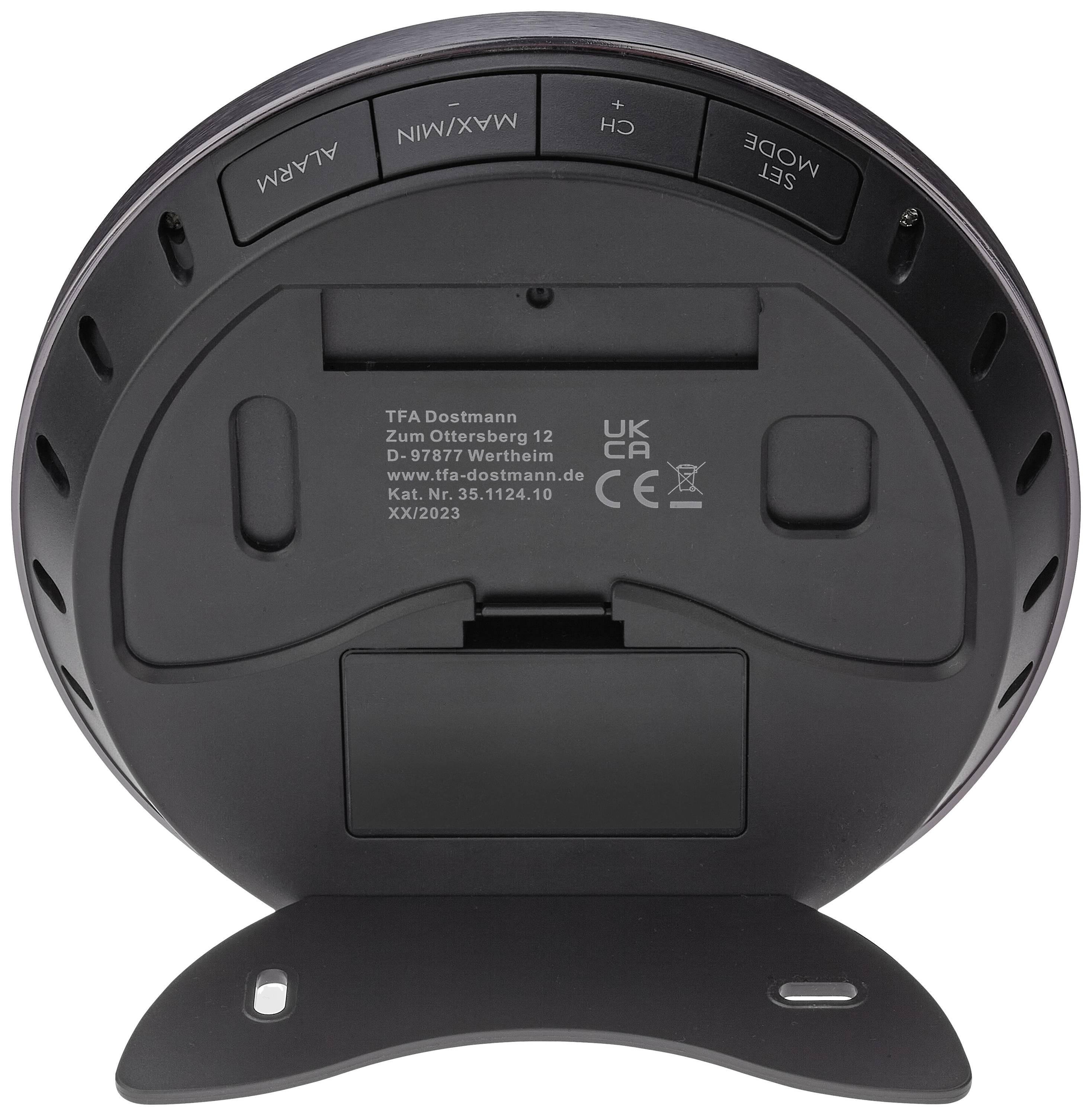 Bagsiden af en enhed med batterirummet og taster til 'Alarm', 'Max/Min', 'CH', 'Mode'. Producent TFA Dostmann, modelnummer 30.1124.10.