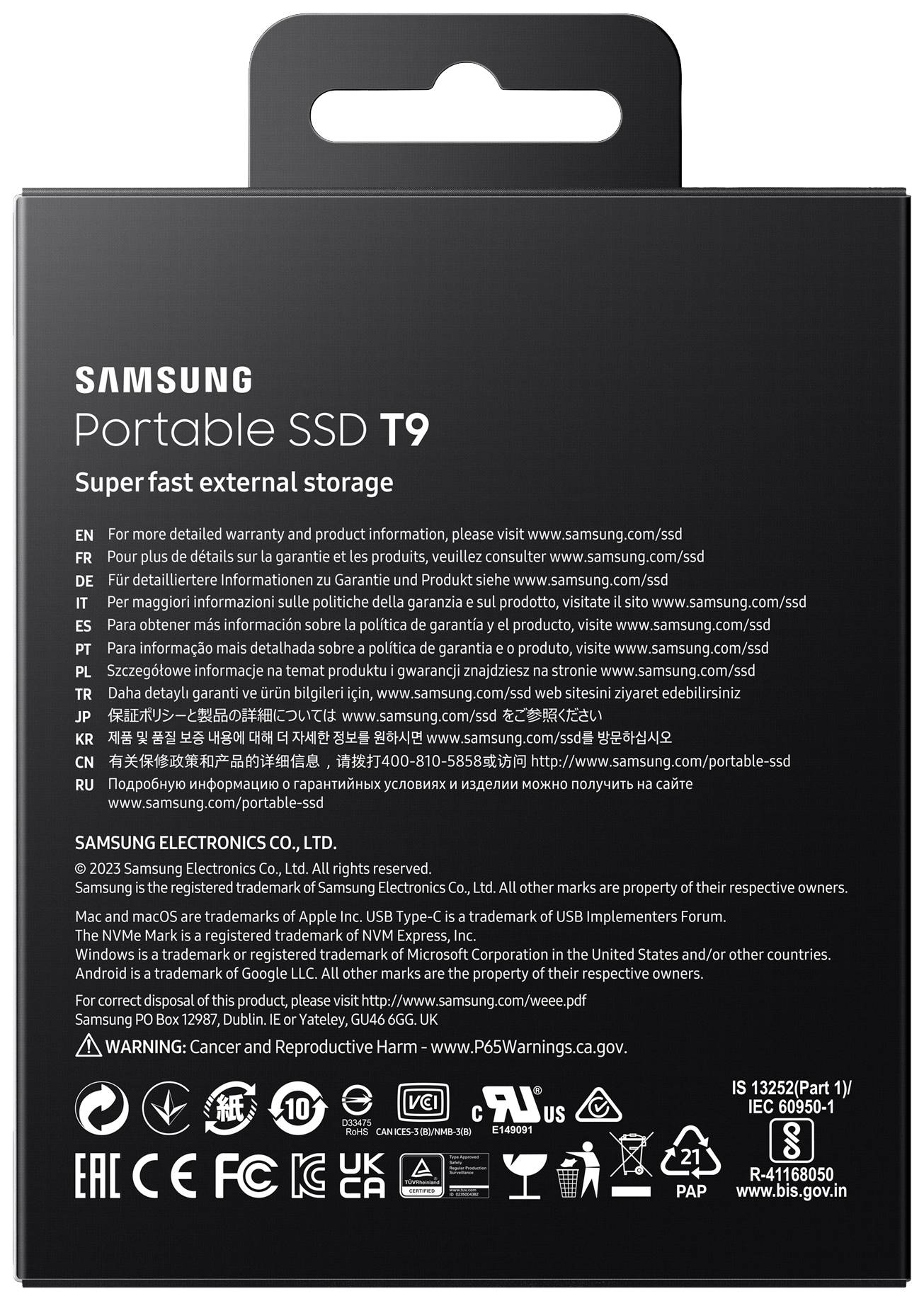 Bagsiden af en Samsung Portable SSD T9 emballage med tekniske detaljer, garantioplysninger og producentmeddelelser på flere sprog.