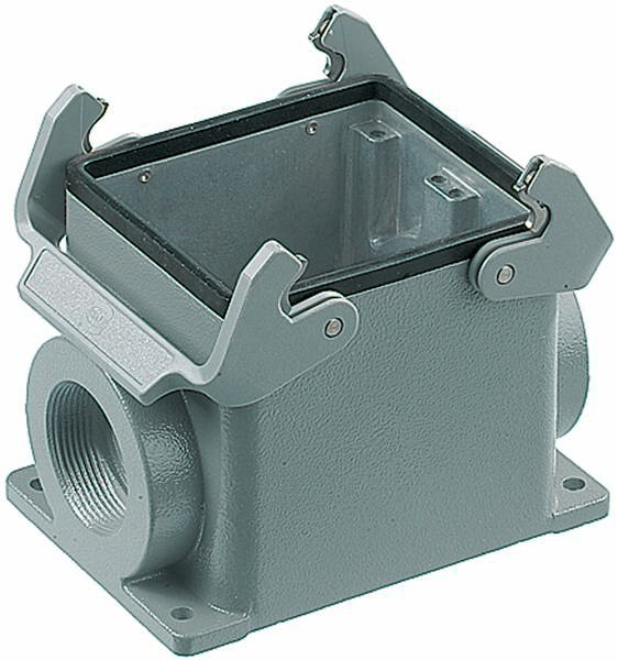 'Rektangulær grå metalinddækning med sidelige åbninger og to opklappelige låse på oversiden.'