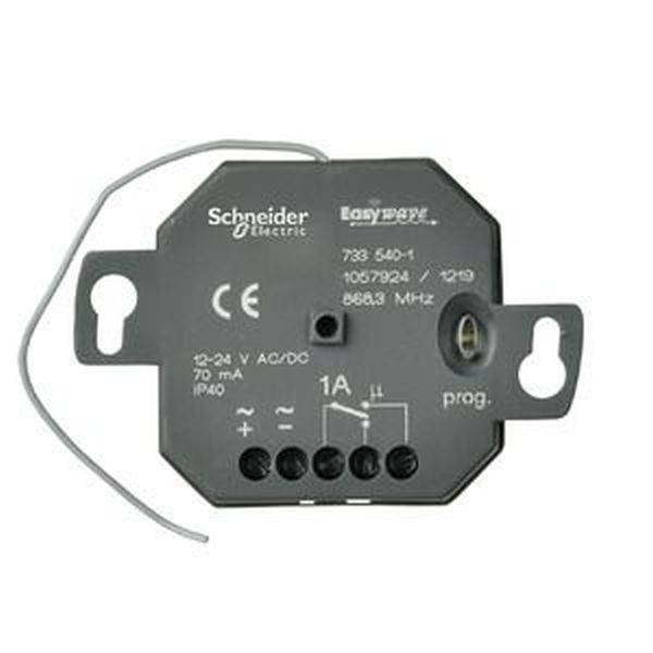 Sort-grå elektrisk komponent fra Schneider Electric, modelnum­mer 733 540-1. Den har flere tilslutningsklemmer og ledninger.