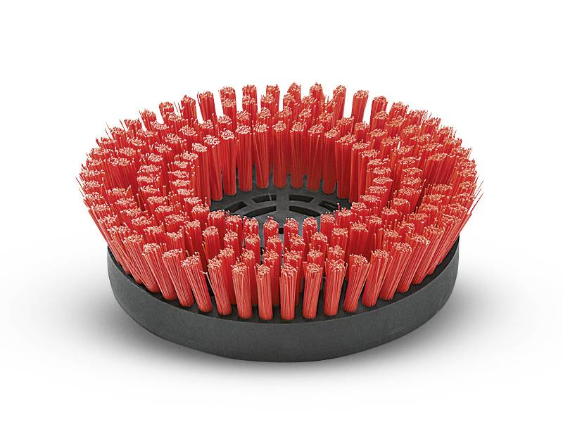 Rund rengøringsbørste med røde børster på en sort base.